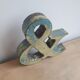 Ancient iron letter