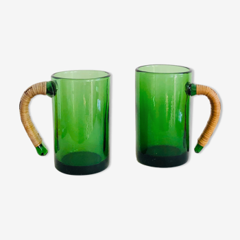 Pair of vintage glass and wicker mugs