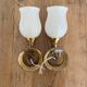Set of 2 golden, bronze and brass torch wall lights