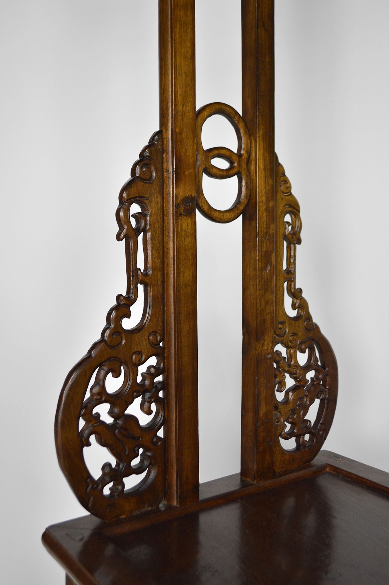 Wardrobe with Asian coat made of wood carved with dragons
