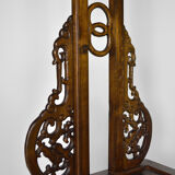 Wardrobe with Asian coat made of wood carved with dragons