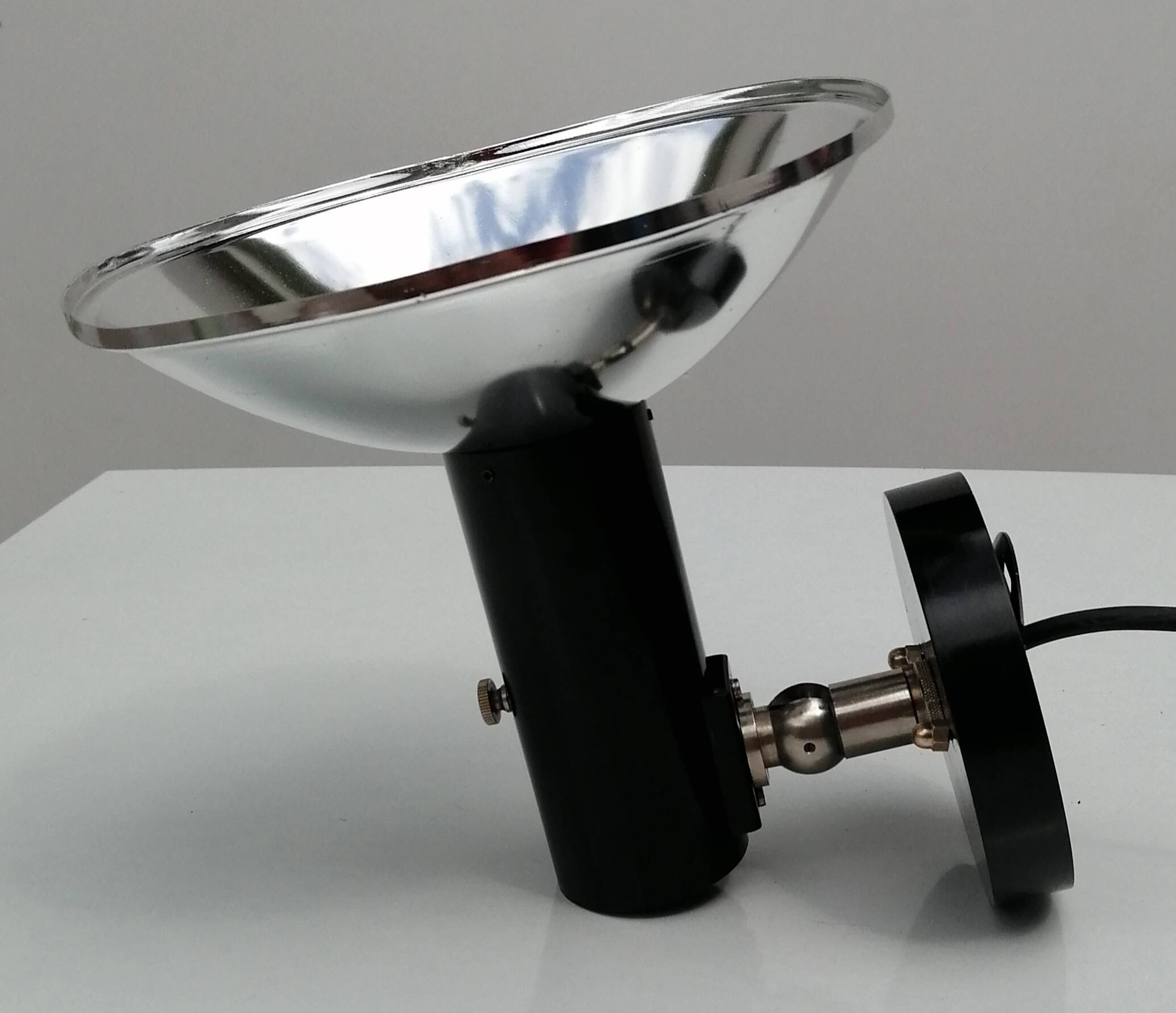 Adjustable black and chrome wall light from Raak, vintage 1960.