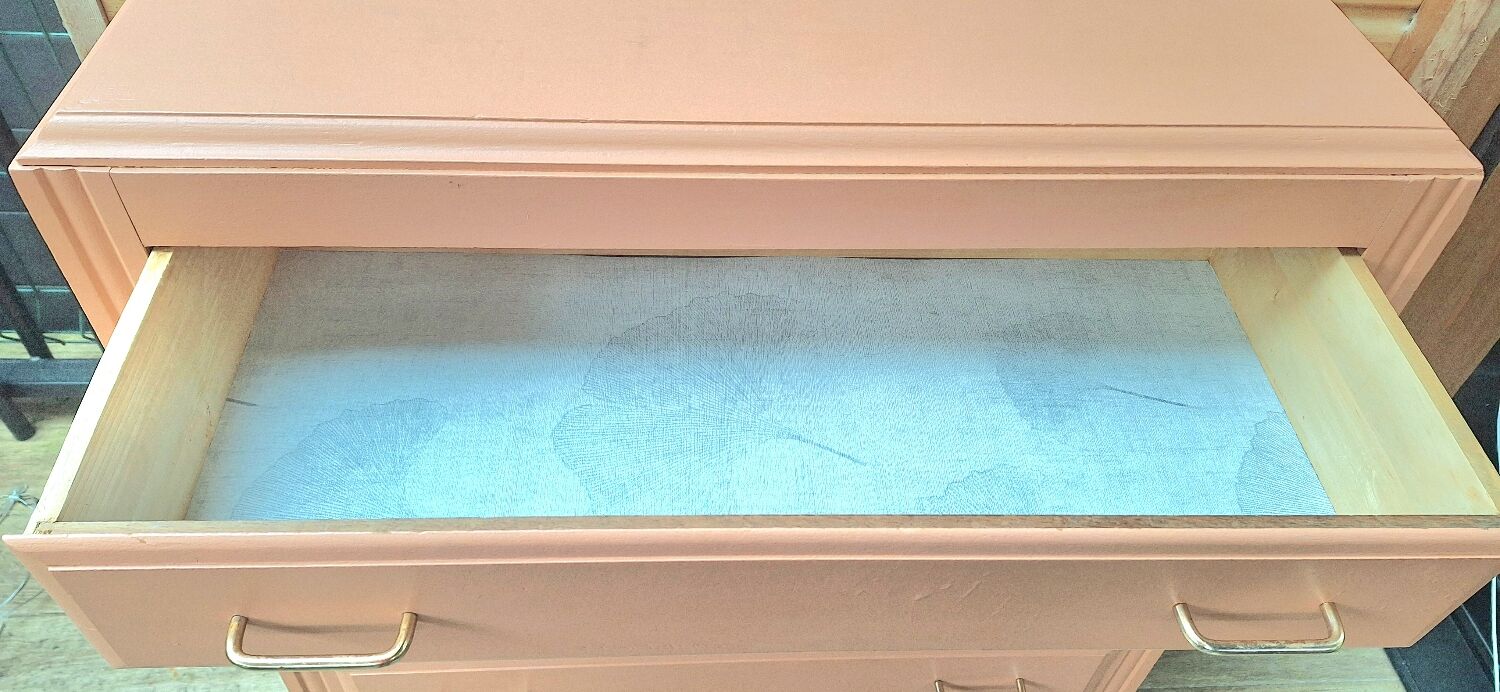 Pretty vintage salmon chest of drawers.
