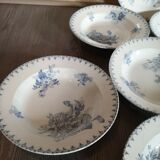 Series of 7 hollow plates in Sarreguemines earthenware model Flore