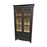 Former black patinated showcase