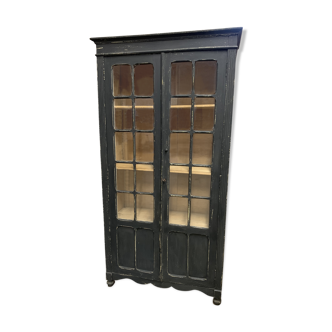 Former black patinated showcase