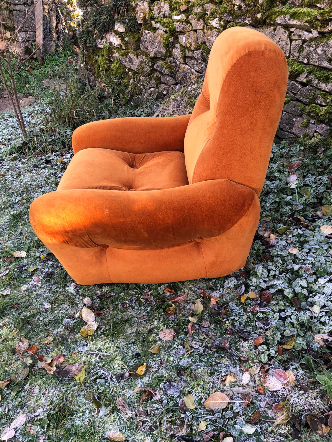 Orange velvet armchair