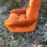 Orange velvet armchair