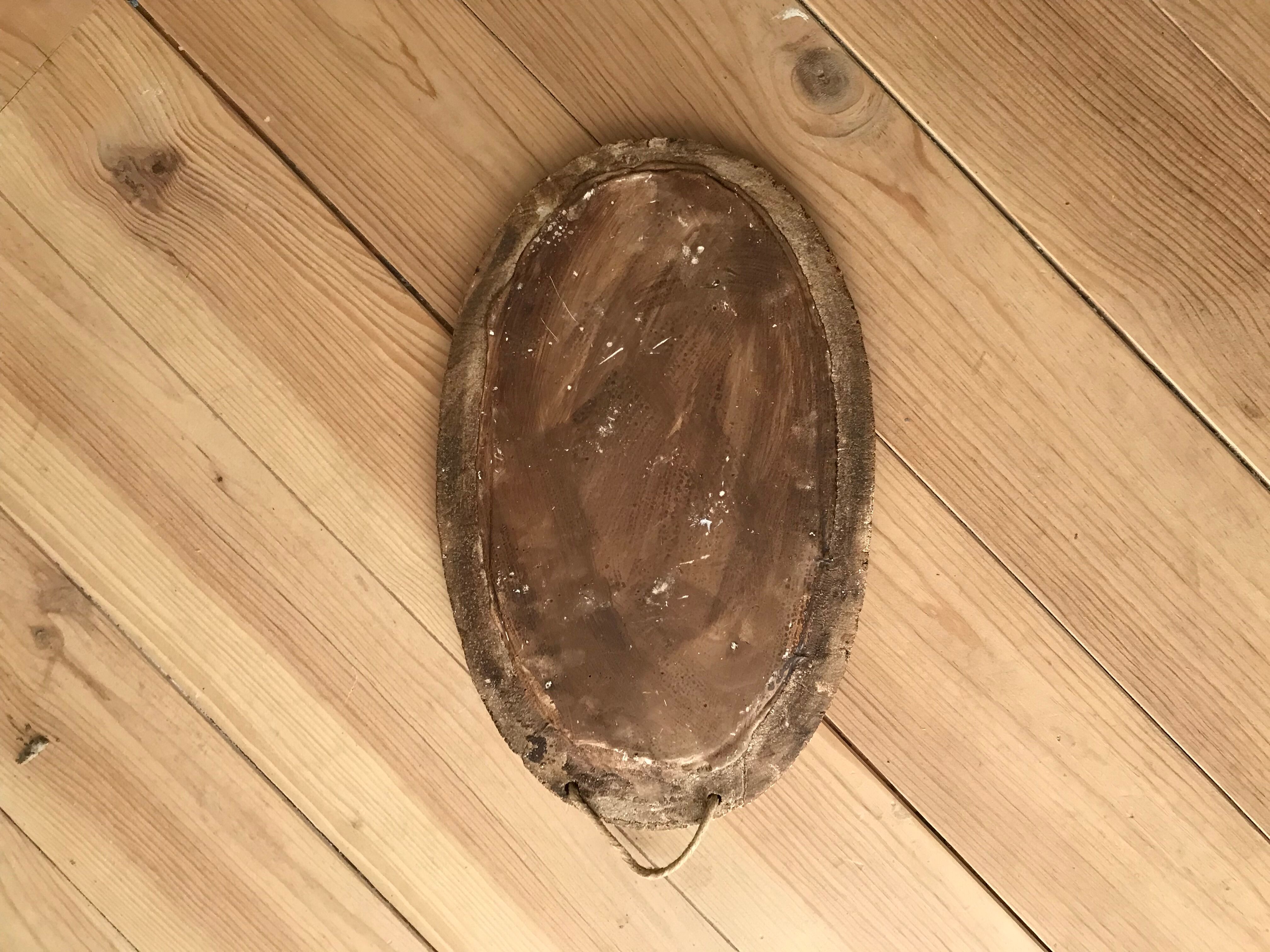 Ceramic mirror decorated with flowers, circa 1960 25x40cm