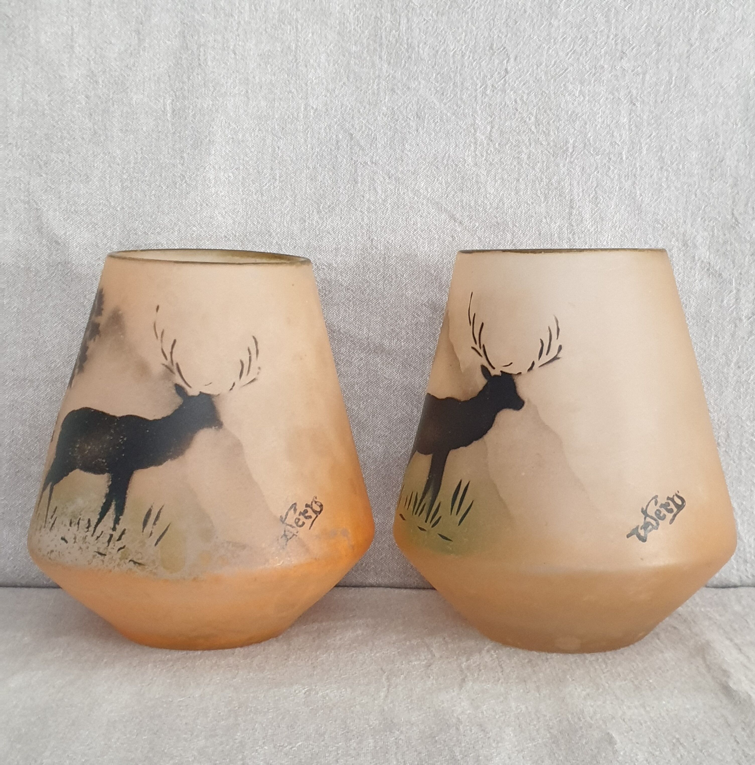 Couple of vases with deer decoration signed