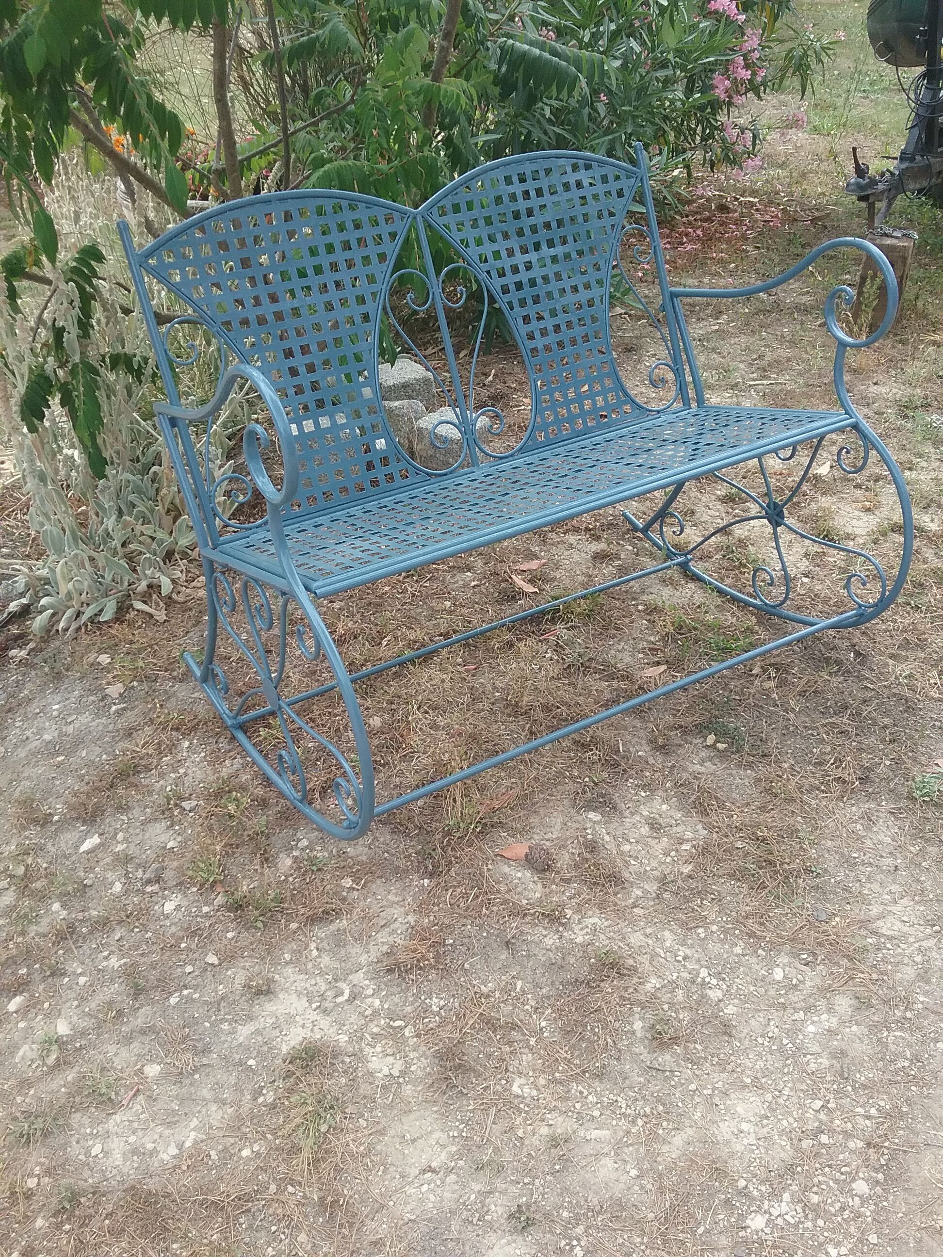 Large wrought iron rocking chair