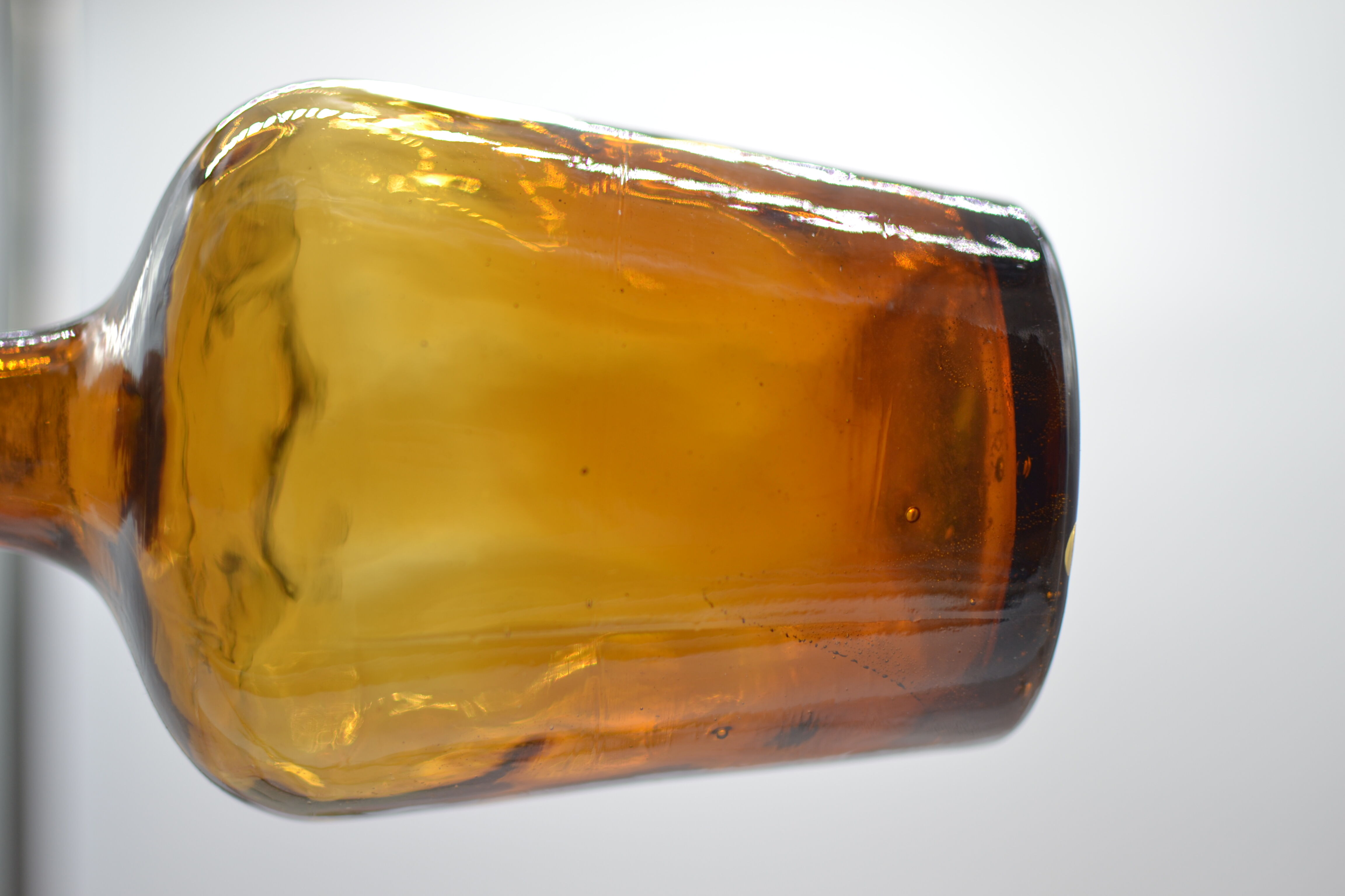 Lady jeanne in amber glass irregular appearance