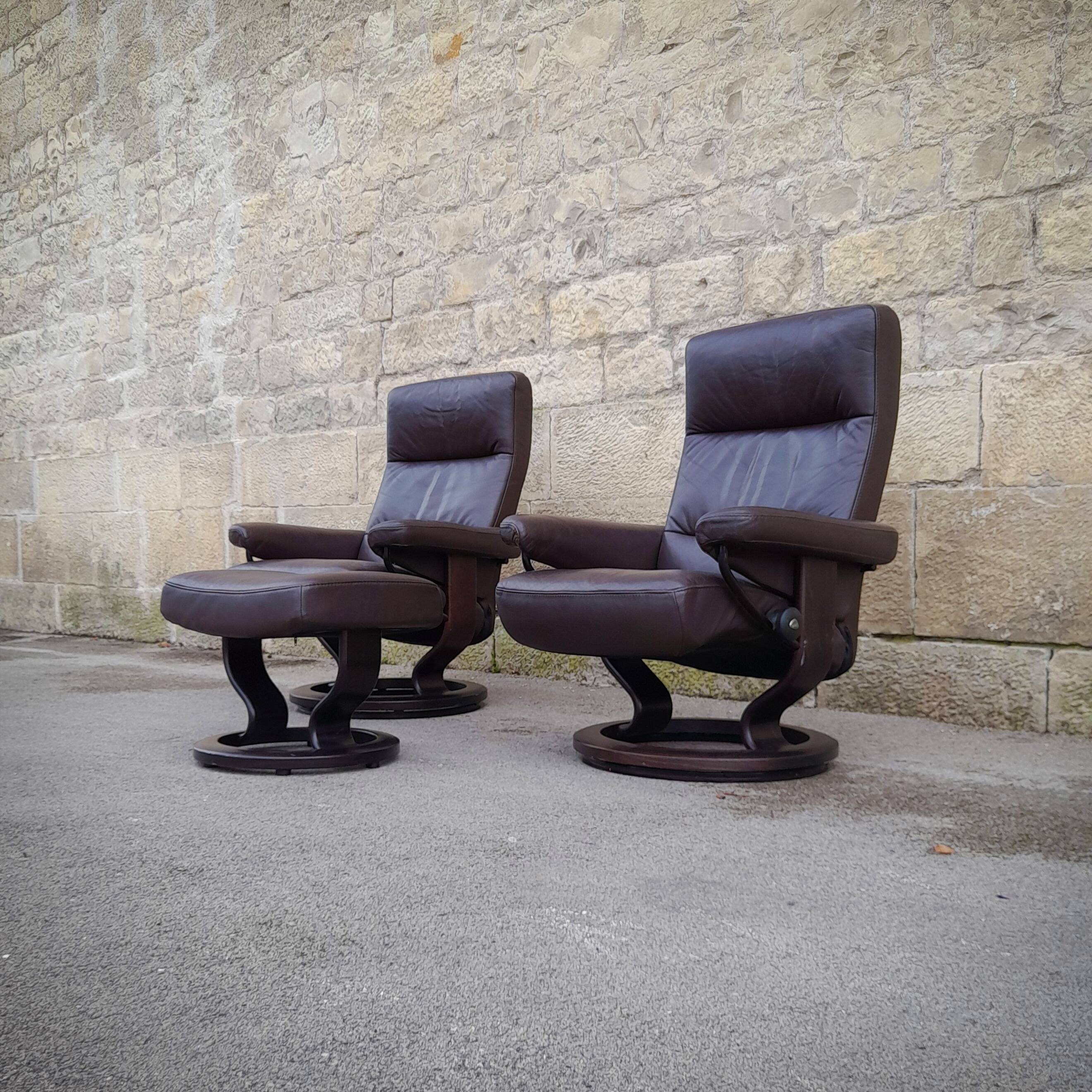 Pair of Scandinavian leather armchairs and ottoman, Ekornes, Norway, 1970s