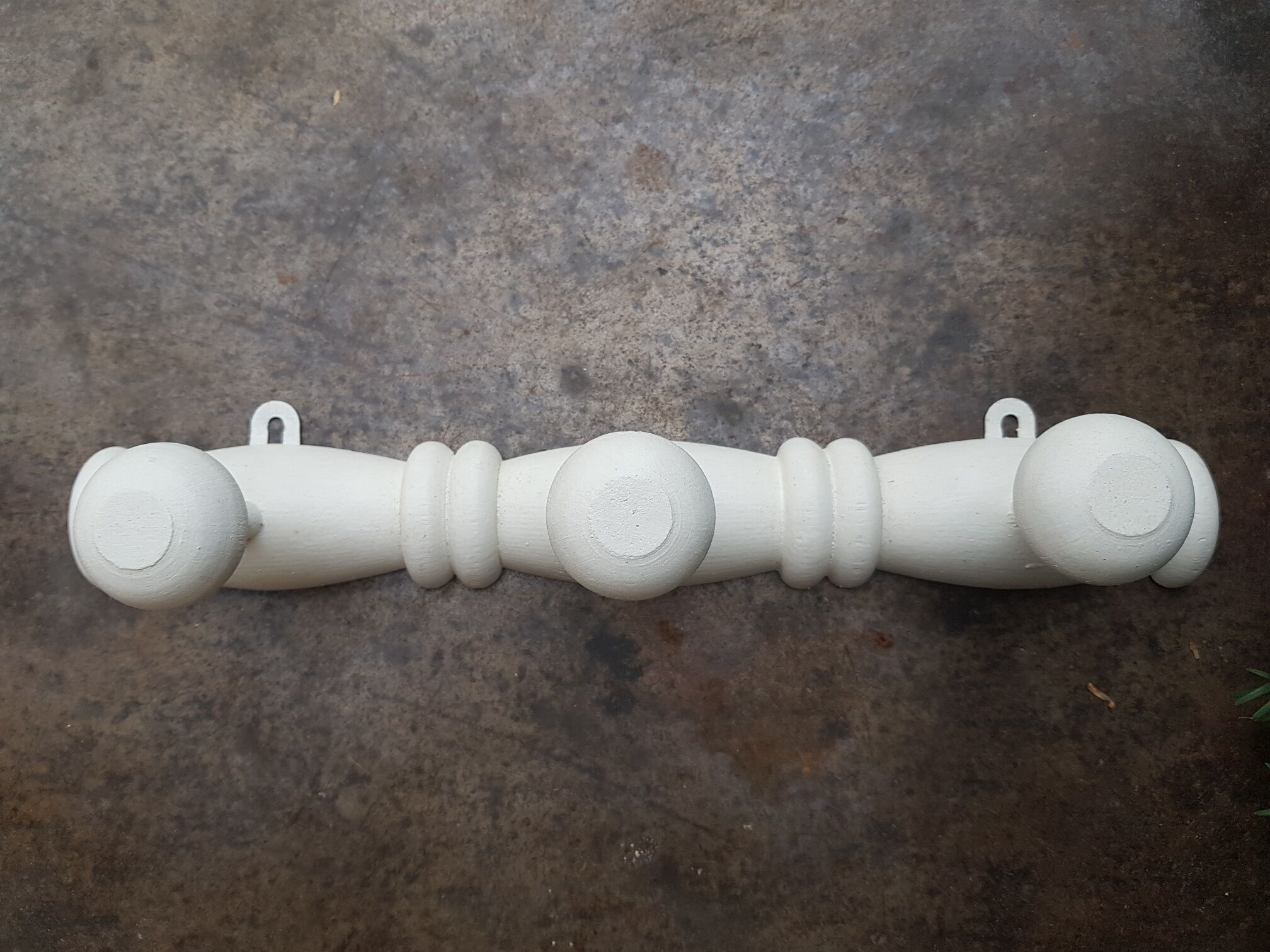 White wooden wall coat rack