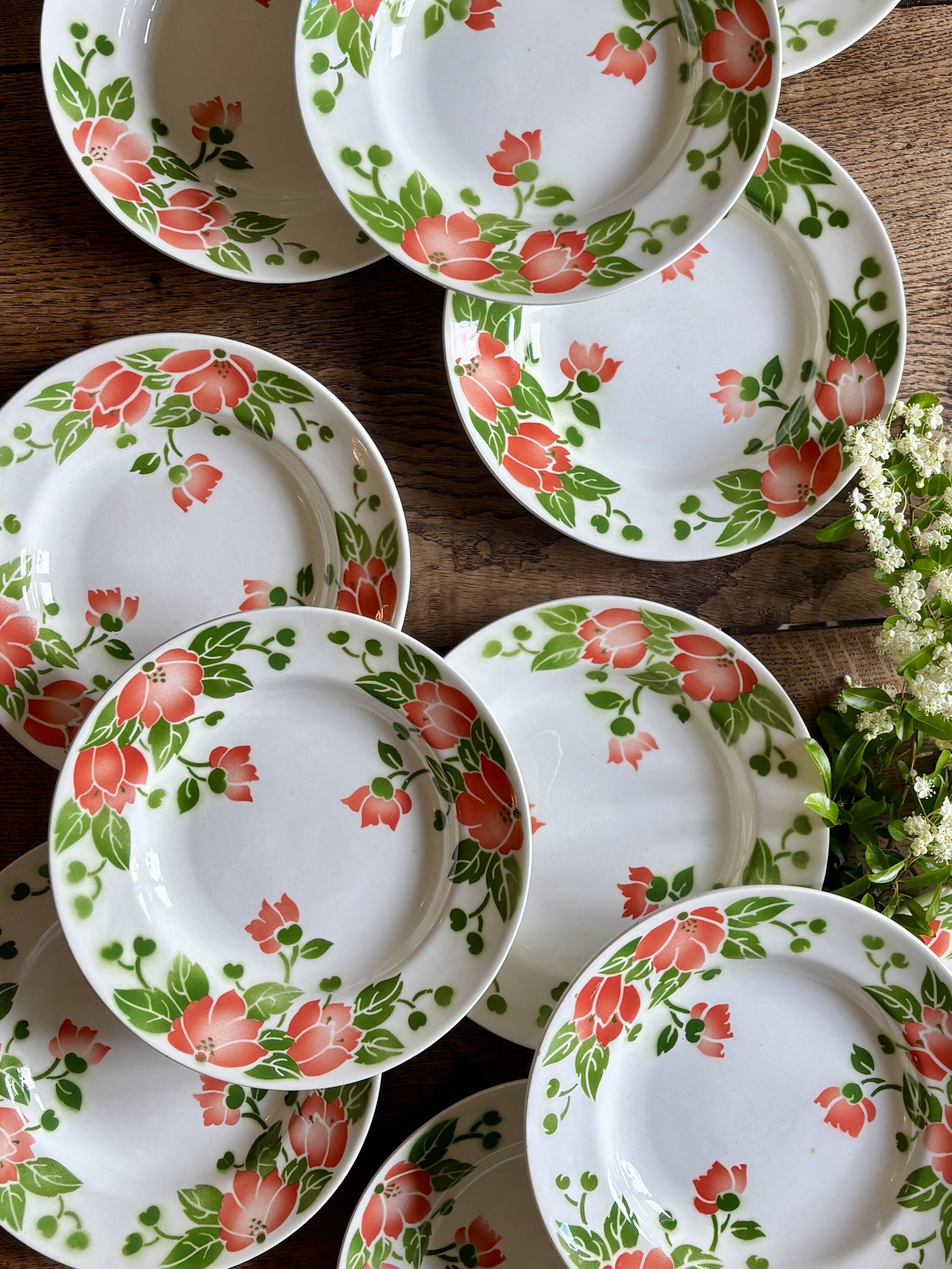 Set of 11 vintage deep plates by Eric de Moulin des Loups.