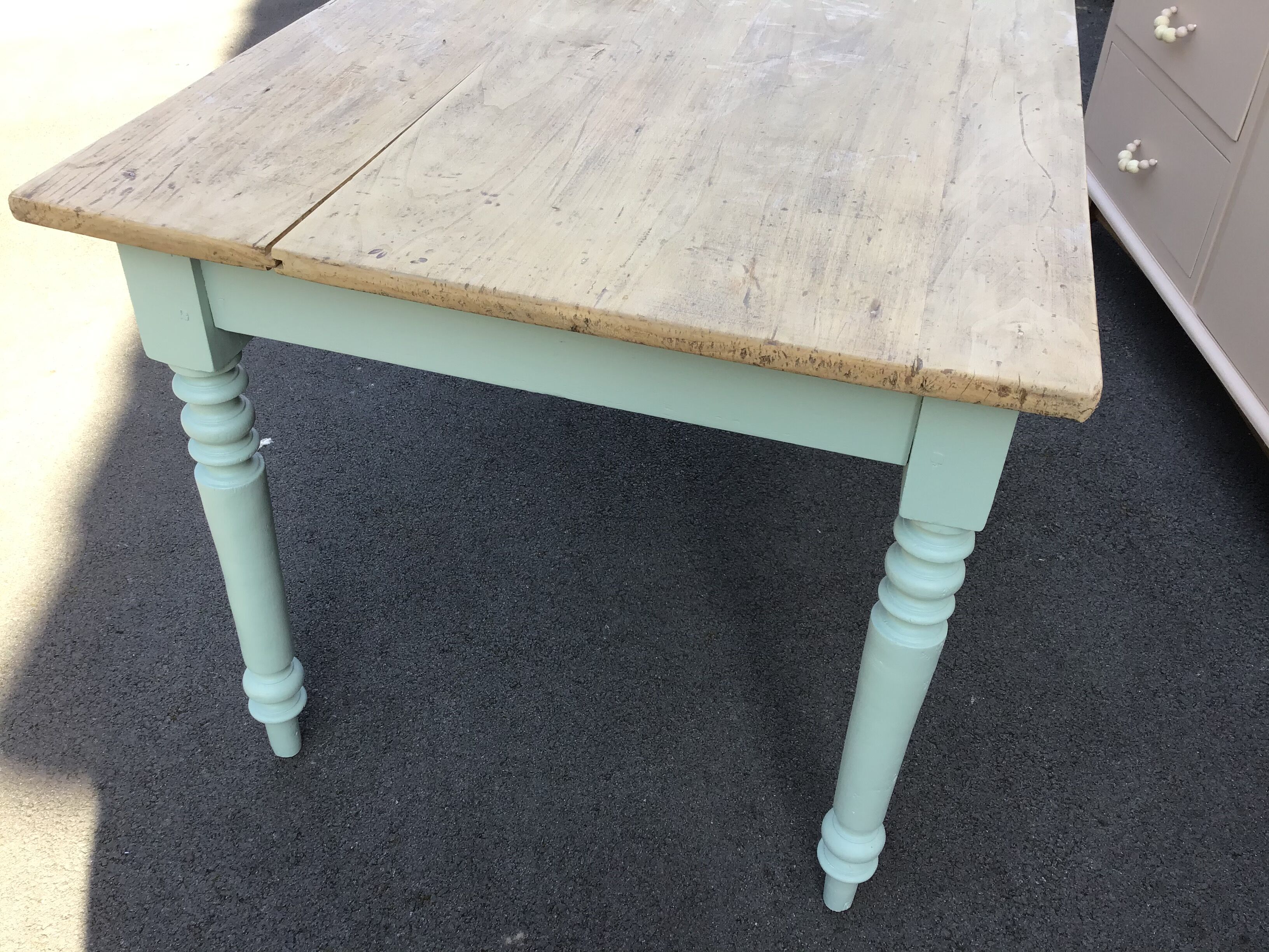 Dining table with painted legs