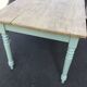 Dining table with painted legs