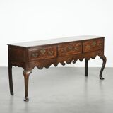 Large antique English oak sideboard from the 18th century with elegant legs