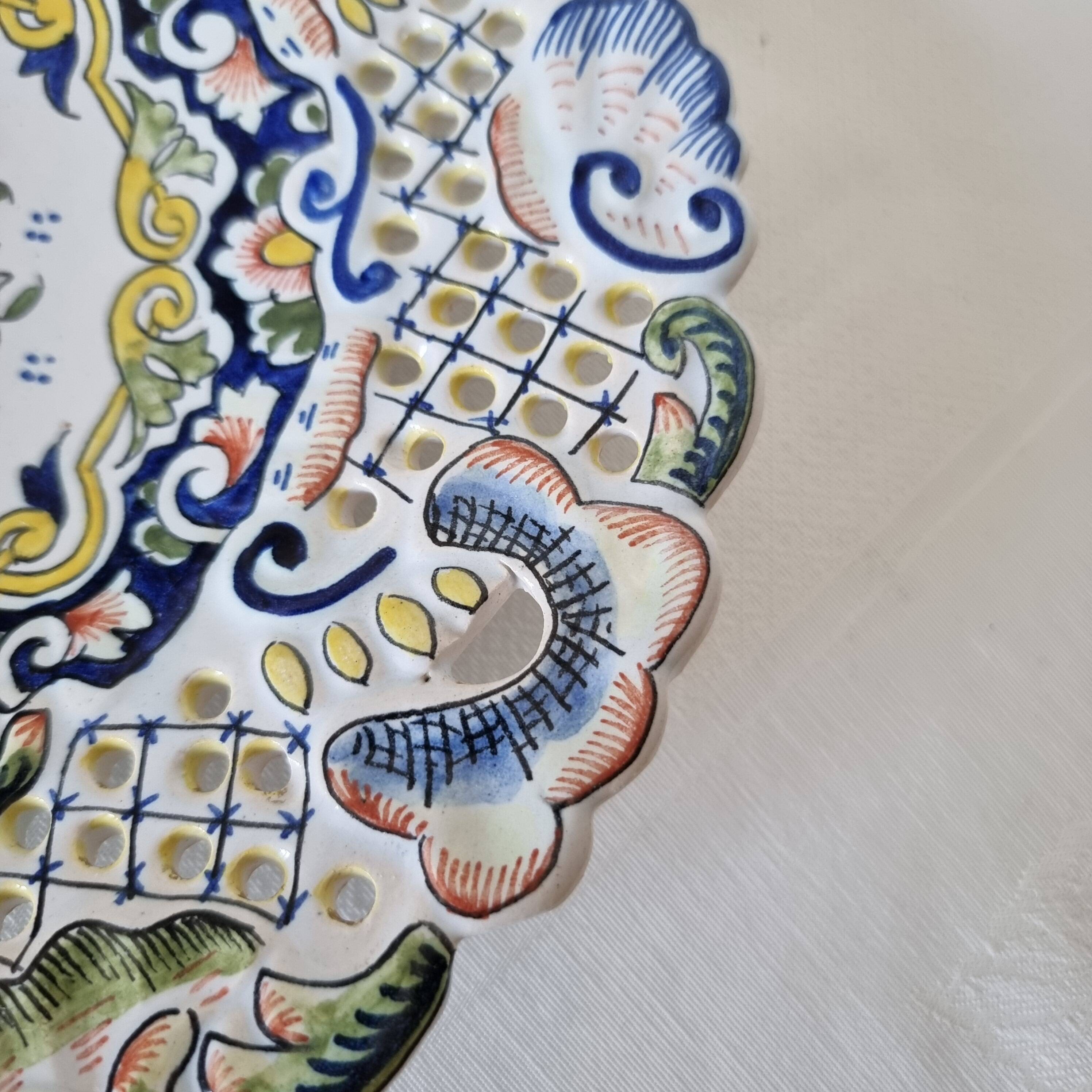 Decorative plate in Rouen earthenware, 19th century