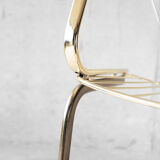 Golden metal armchair 70s