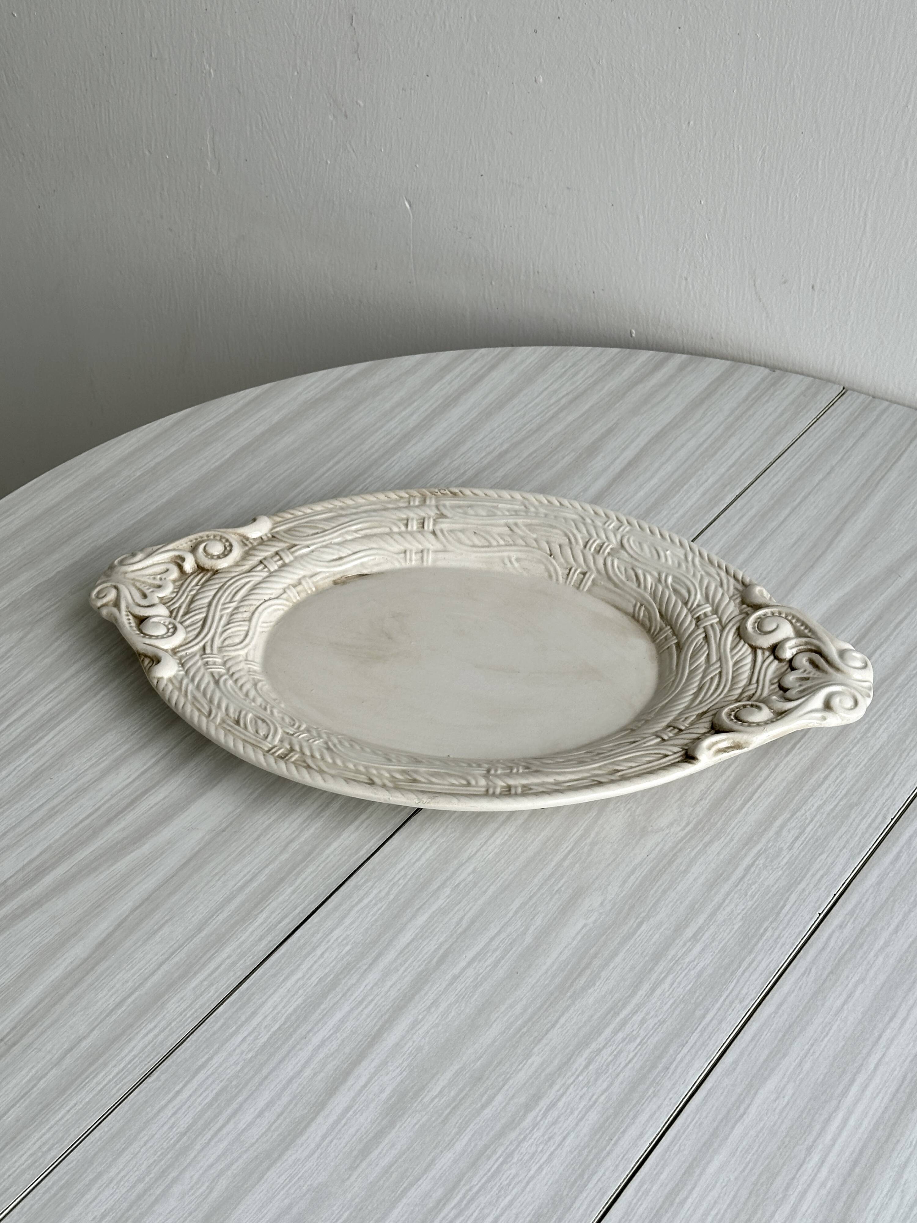Large oval dish in sculpted white ceramic
