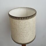 Brutalist floor lamp in turned wood, in the style of Charles Dudouyt.