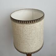 Brutalist floor lamp in turned wood, in the style of Charles Dudouyt.