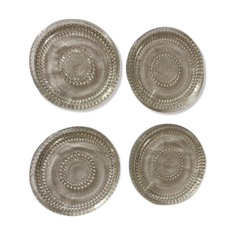 Under vintage bottles or carafes