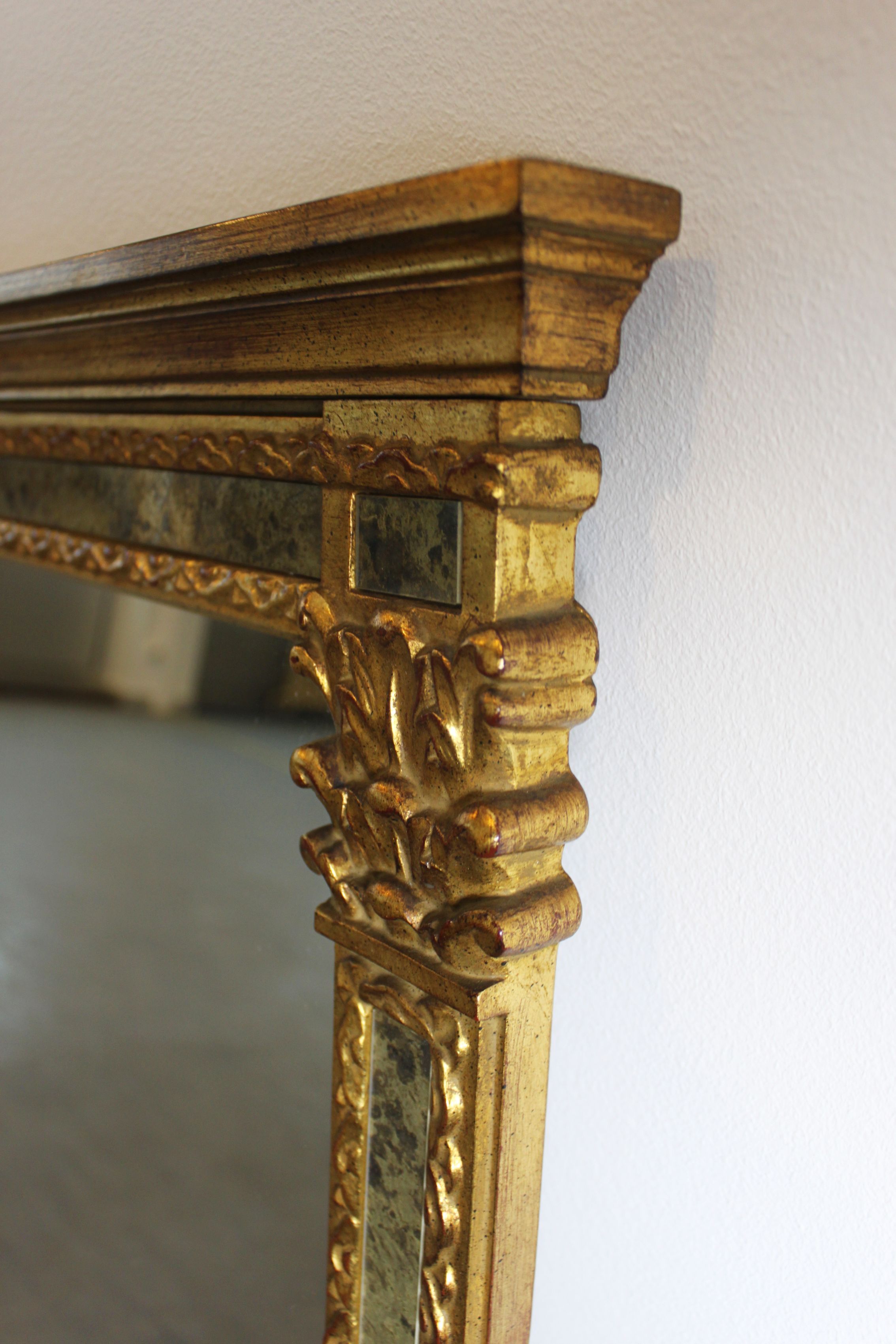 Mirror with parecloses, Regency style.