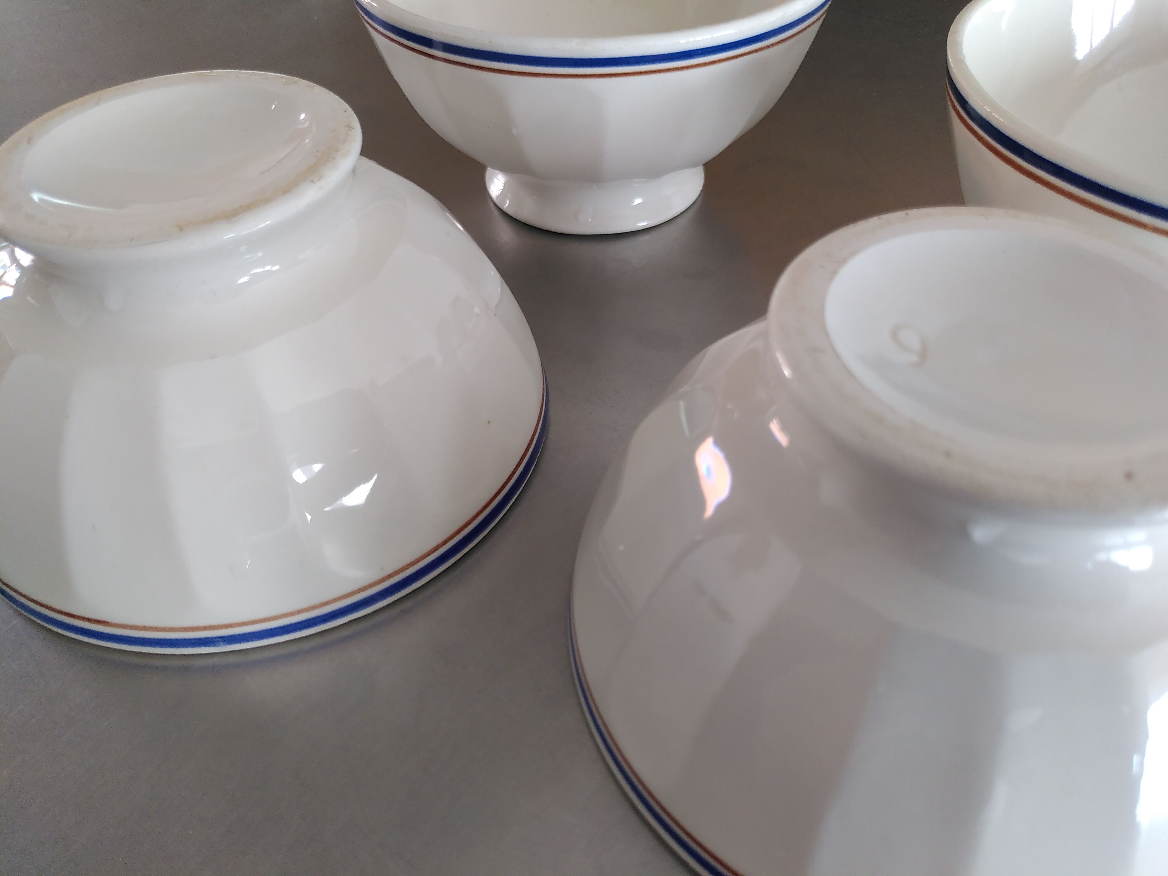 4 striped bowls in faience