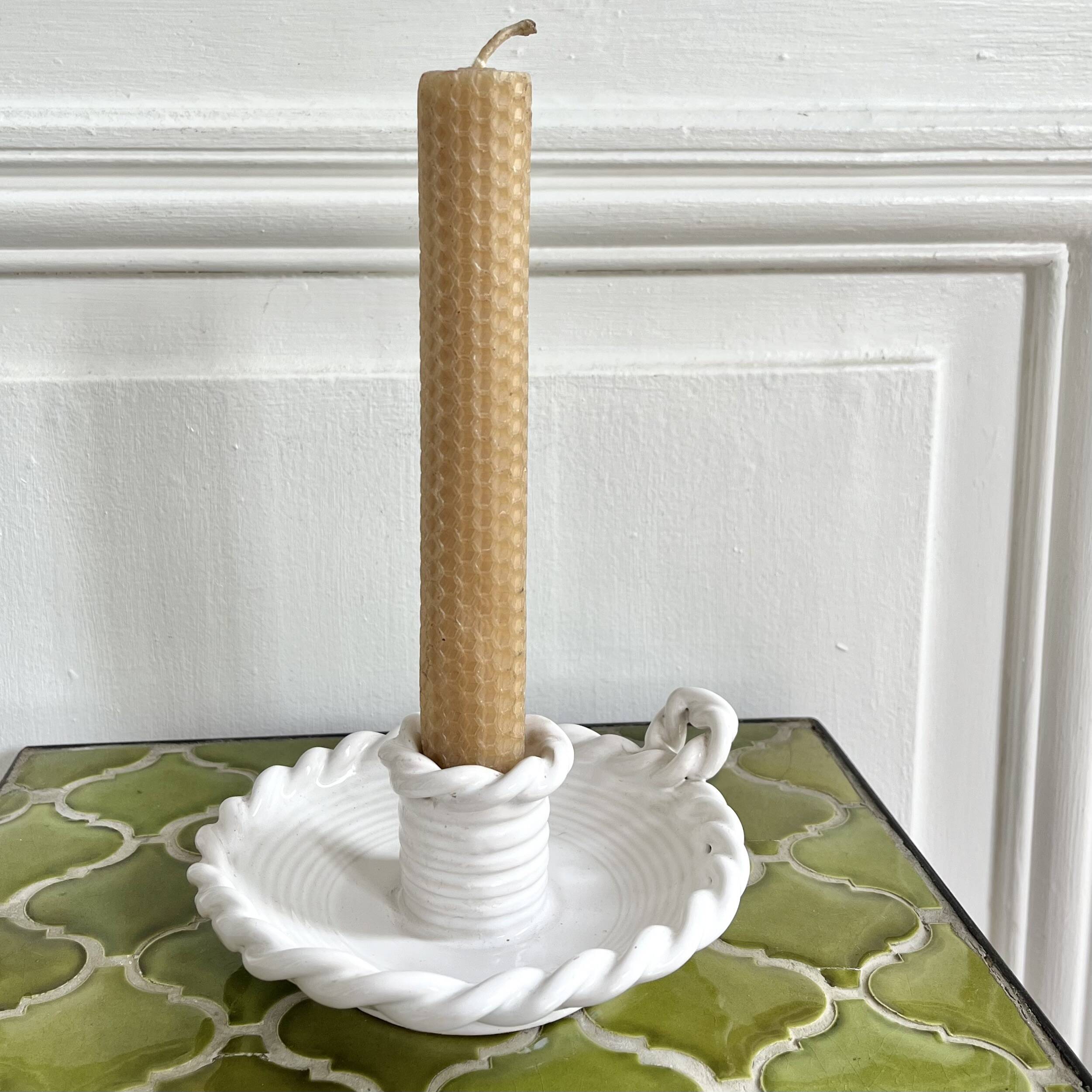 Hand-held candle holder with braided ceramic bowl