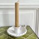 Hand-held candle holder with braided ceramic bowl