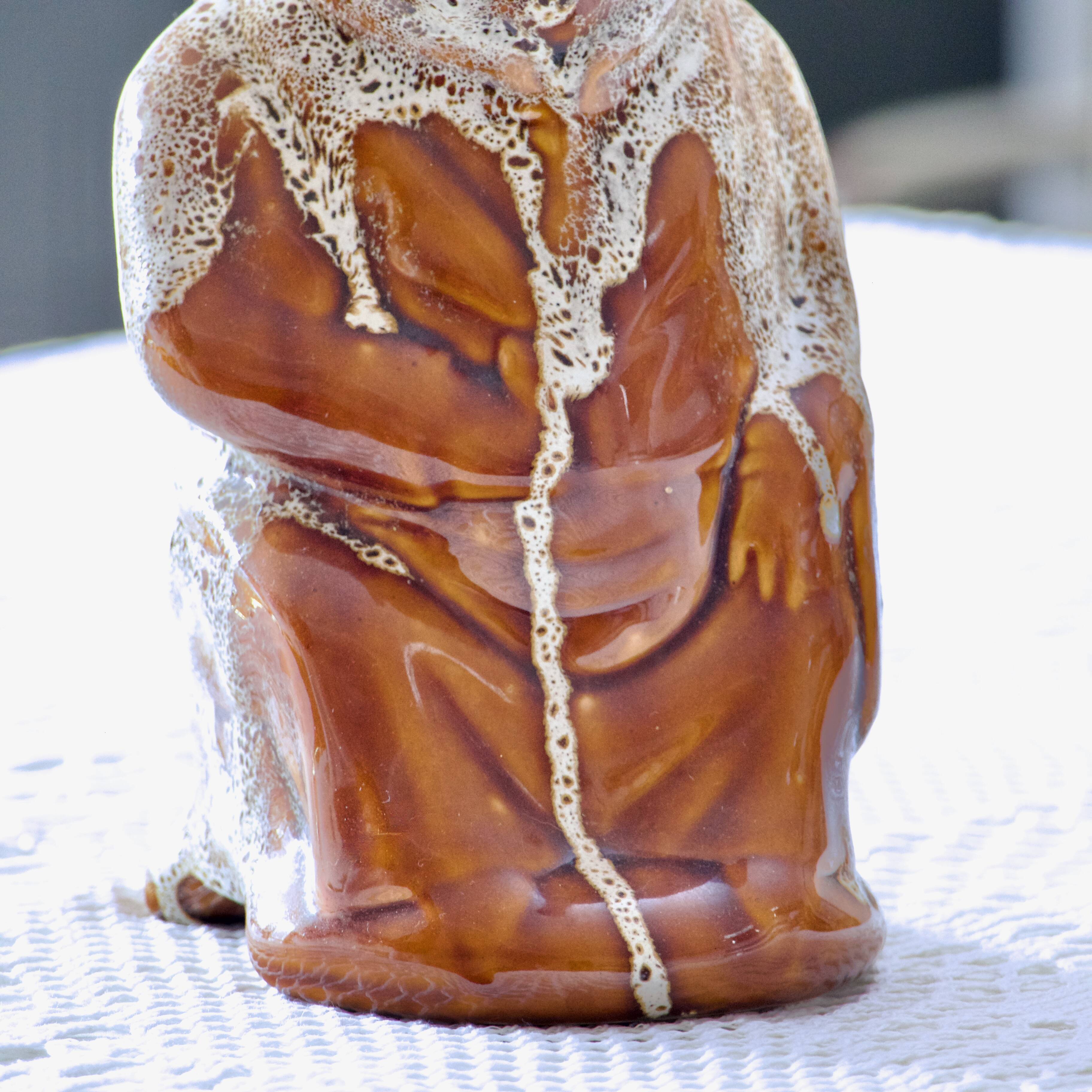 Antique zoomorphic pig carafe in foam-enameled stoneware