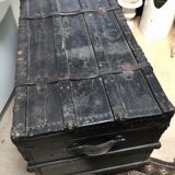 Black ancient travel trunk, 19th