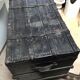Black ancient travel trunk, 19th