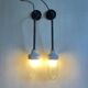 Pair of Art Deco wall lights in cast iron, glass and ceramic from the 1930s.