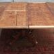 English oval table with 19th century mahogany extensions