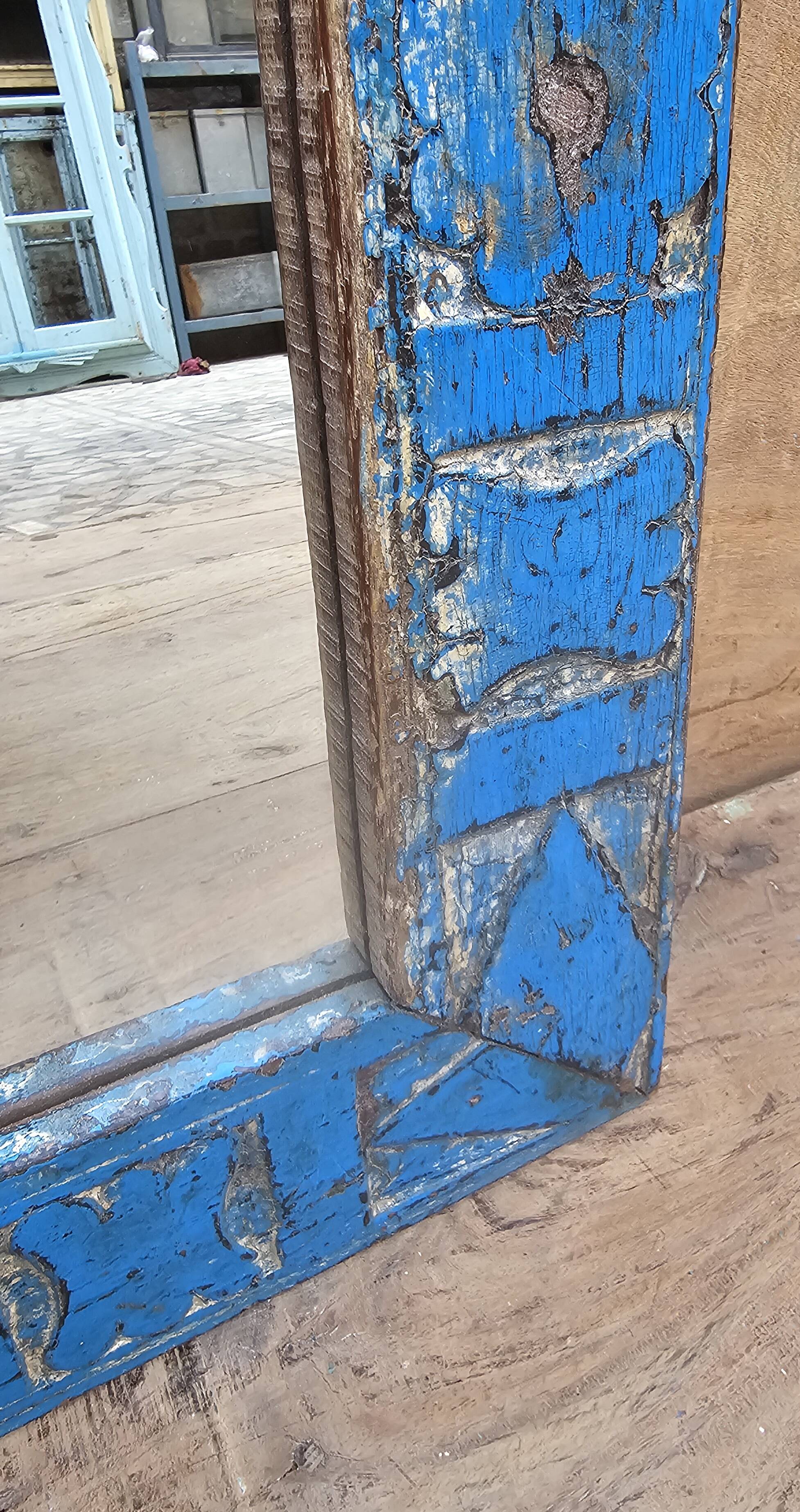 Antique Art Deco mirror in Burmese teak.