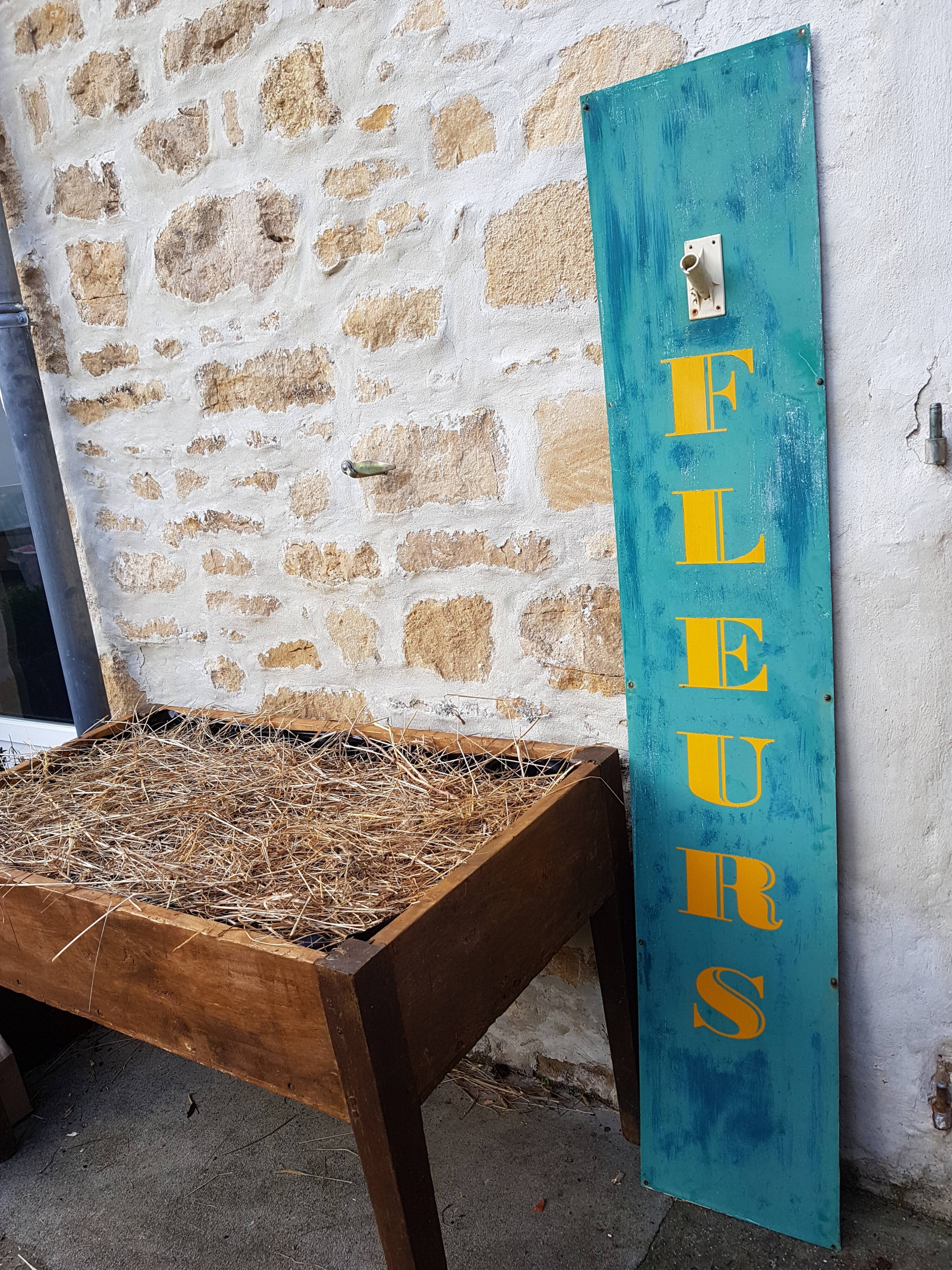 Former painted plate sign of florist