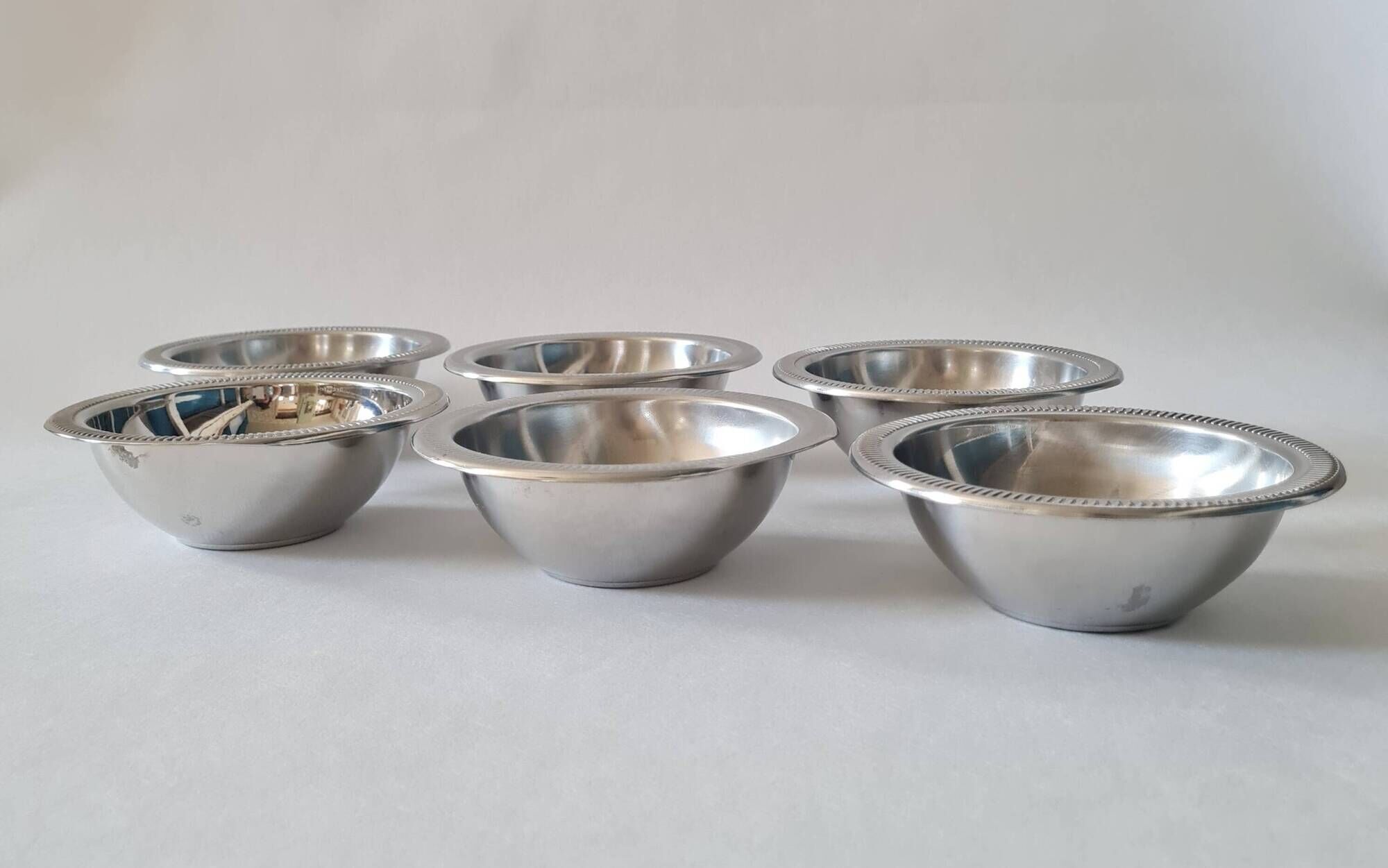Set of 6 small vintage stainless steel bowls.