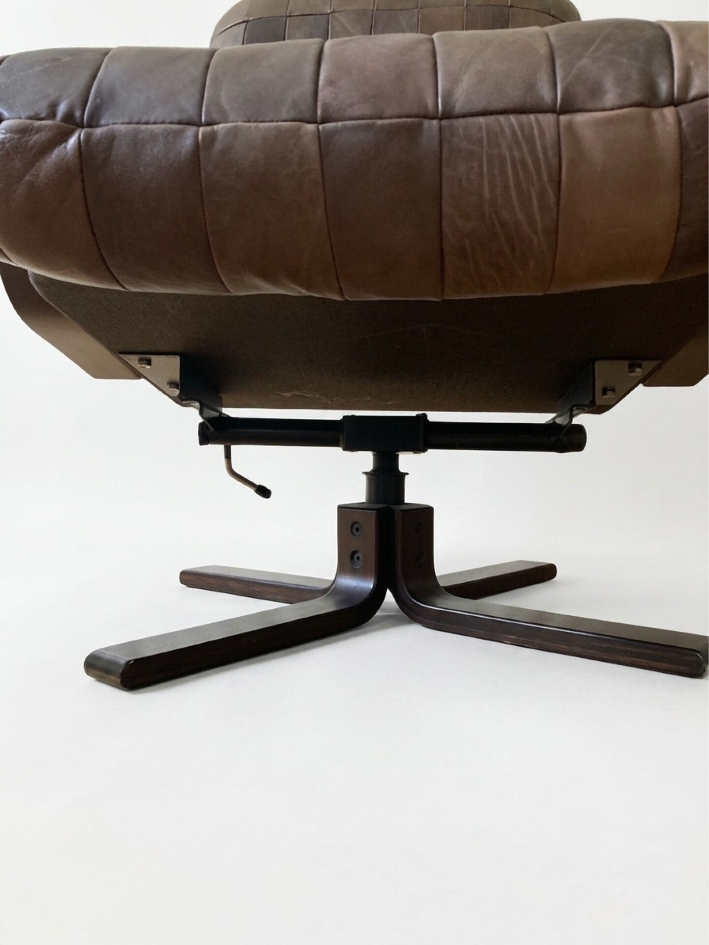Mid-century leather swivel chair