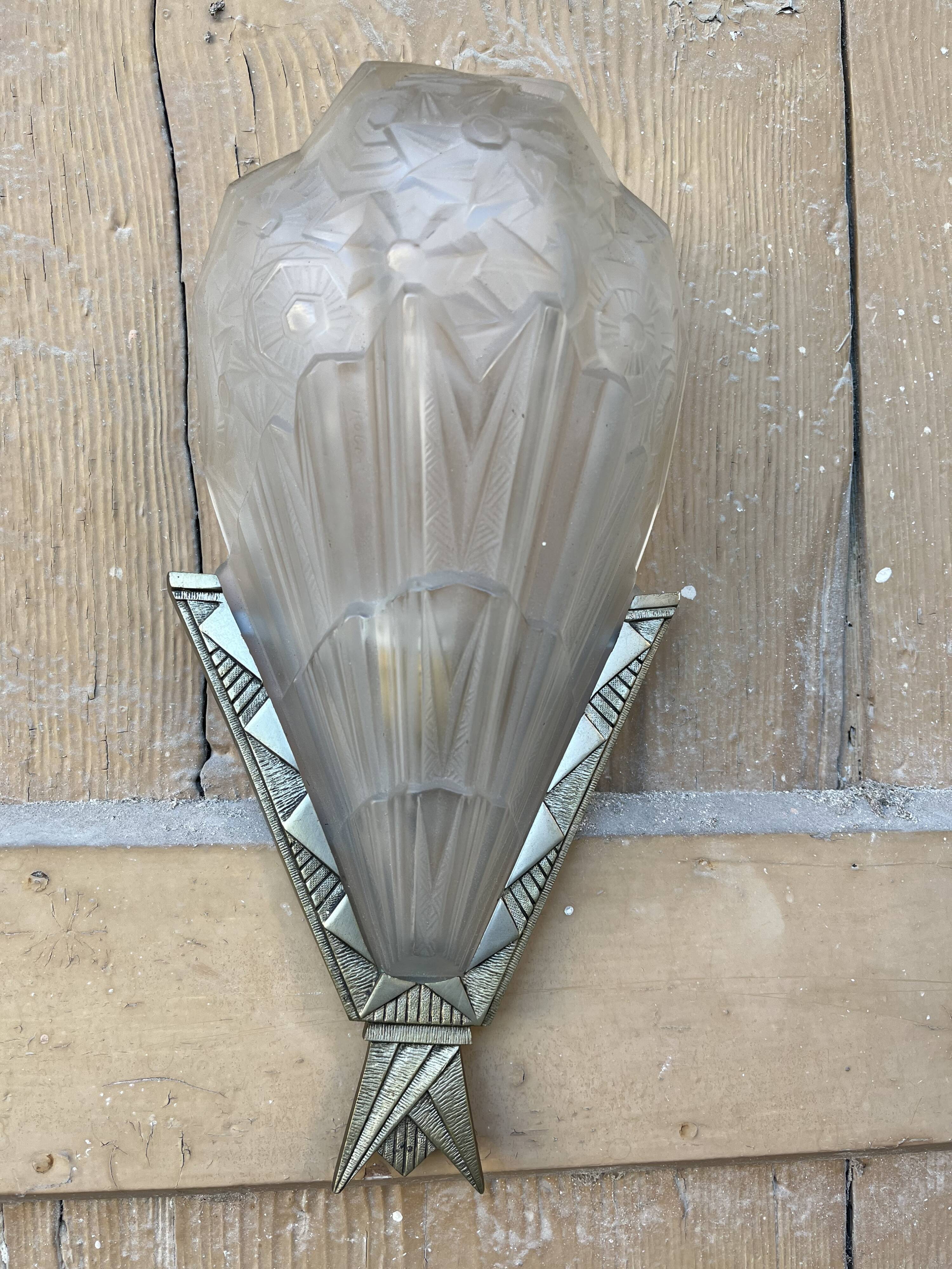 Signed art deco wall light