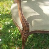 Pair of Rocaille style armchairs in green fabric and walnut, 19th century