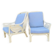 Pair of white rattan armchairs