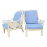 Pair of white rattan armchairs