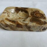 Marble pocket ashtray with fossil ammonite