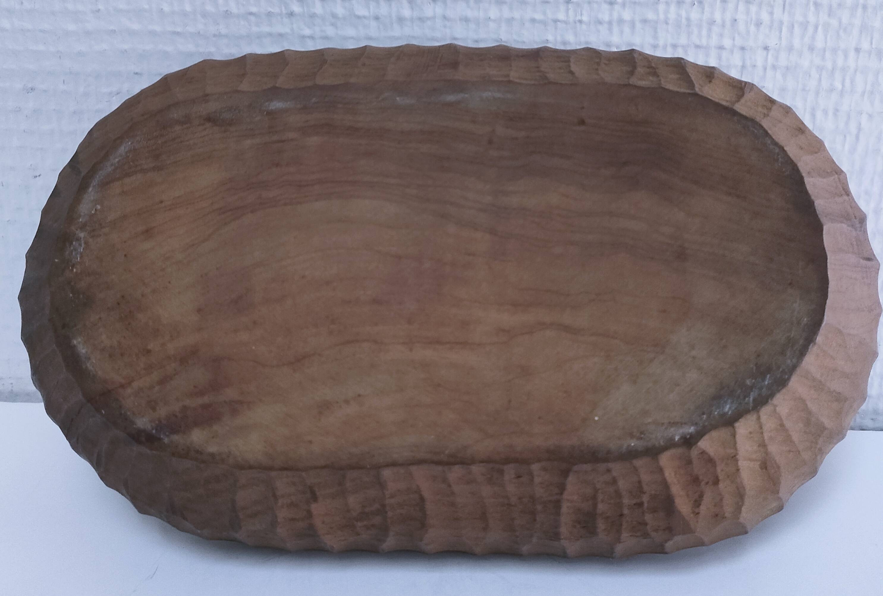 Solid wood pocket emptier, gouged