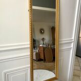 Miroir allongé en stuc doré années 60-70