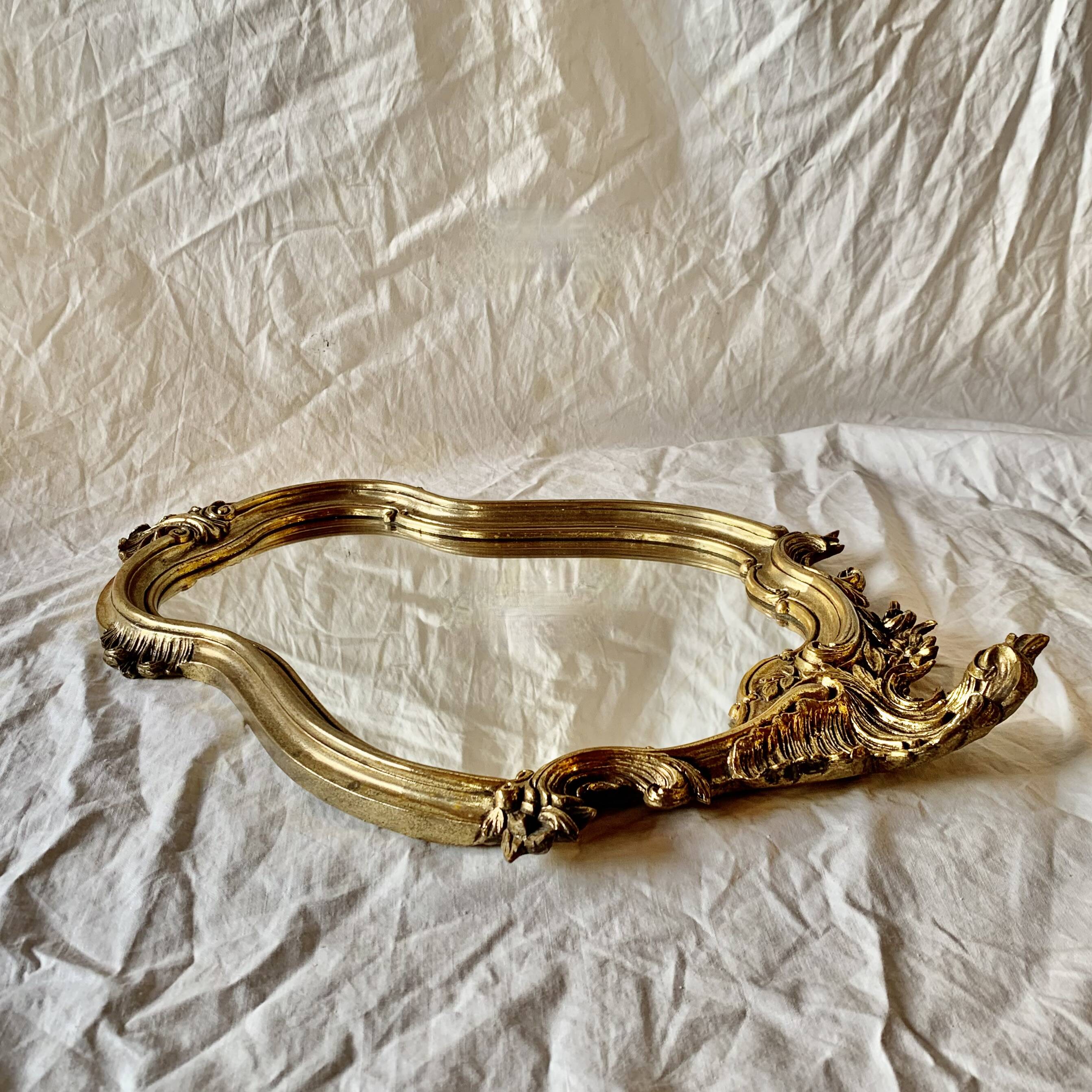 Old wall mirror in golden resin rococo style - made in france