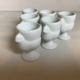 Six white hen egg cups